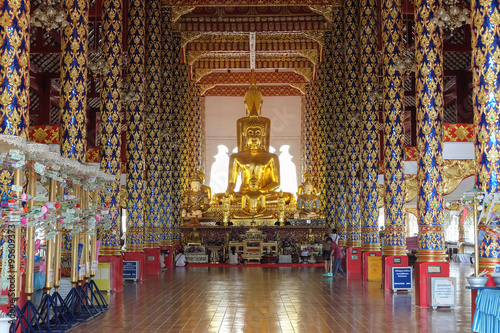 golden buddha statue in wat suan dok temple, chiang mai photo