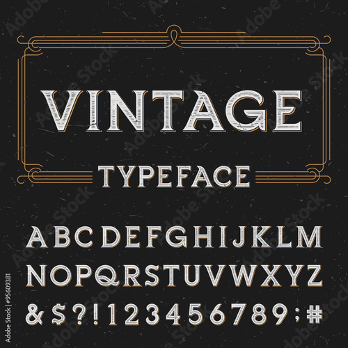Vintage vector typeface. Type letters, numbers and symbols on a dark distressed background. Alphabet font for labels, headlines, posters etc.