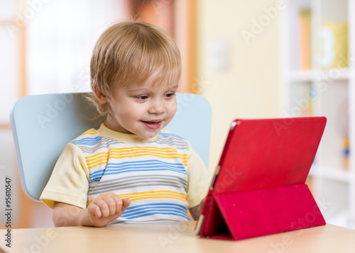 Little boy with tablet comp...