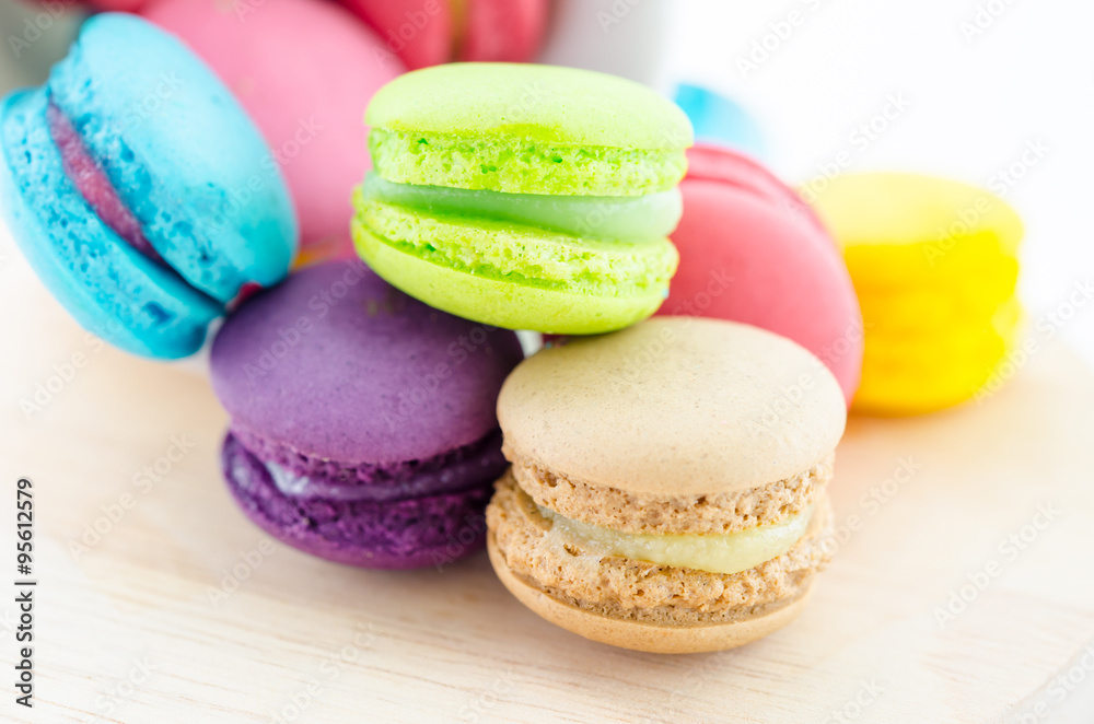 Colorful macaroons in white cup. Colorful macaroons in white cup.