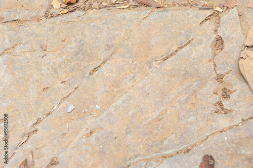 Pavement surface rough brown stone tile floor