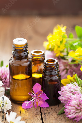Fototapeta Naklejka Na Ścianę i Meble -  essential oils and medical flowers herbs