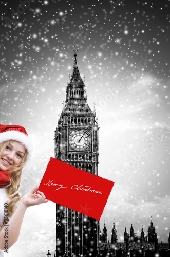 Mädchen mit Weihnachtsmütze vor Big-Ben