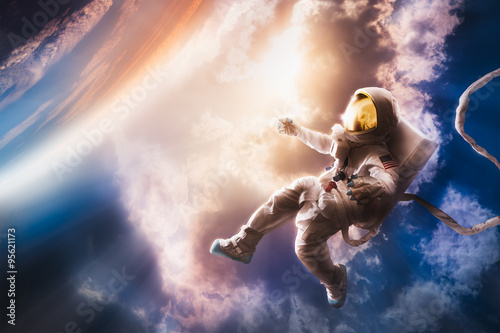 Astronaut floating in the atmosphere