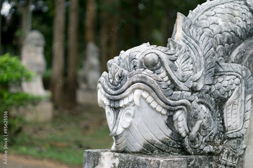 An old sculpture in the park of Thal university