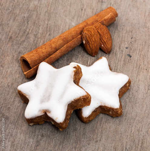 Fien cinnamon cookies on wooden background photo