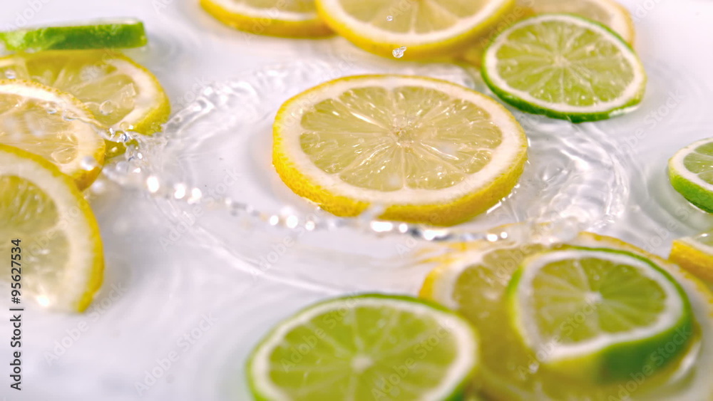 Lemon slices falling into water Lemon slices falling into water