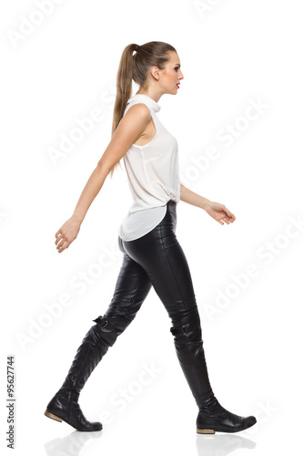 Woman Walking In Leather Trousers