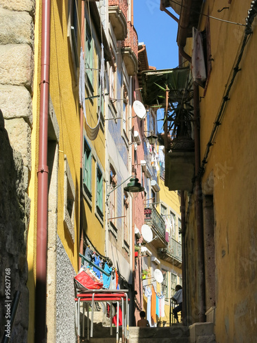 One of many small medieval streets and alleyways in Ribeira district in Porto, Portugal