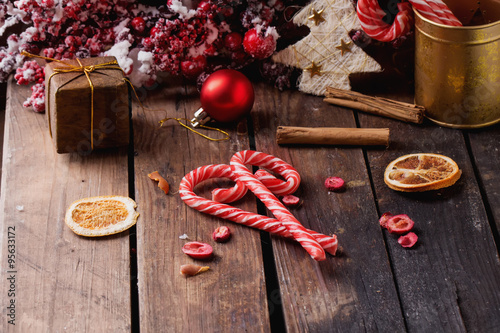 Fototapeta Naklejka Na Ścianę i Meble -  Christmas candies on rustic wooden board