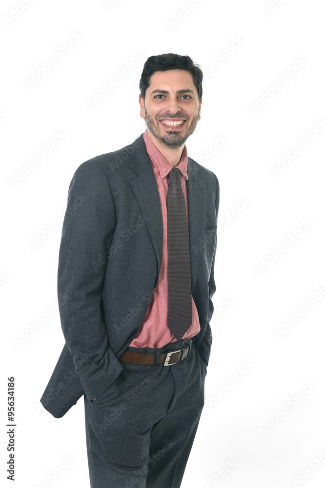 corporate portrait of young attractive businessman of Latin Hispanic ethnicity smiling in suit and tie