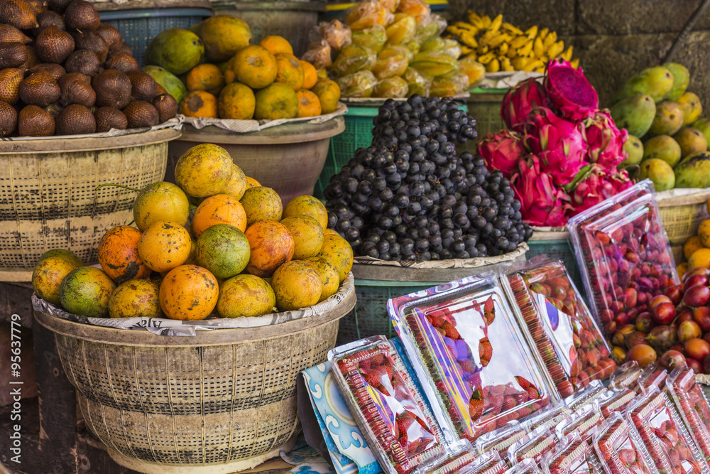Open air fruit market in the village in Bali, Indonesia. Open air fruit market in the village in Bali, Indonesia.