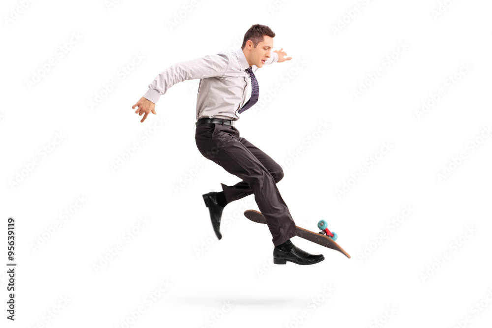 Skillful businessman performing trick on skateboard