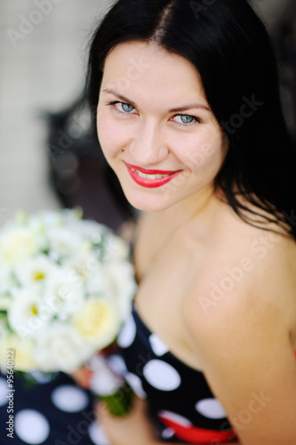 bridesmaid with wedding bouquet