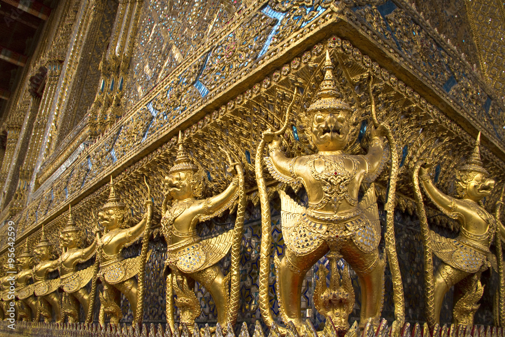Golden garudas guarding the Emerald Buddha in the wat Phra Kaew temple in Bangkok
