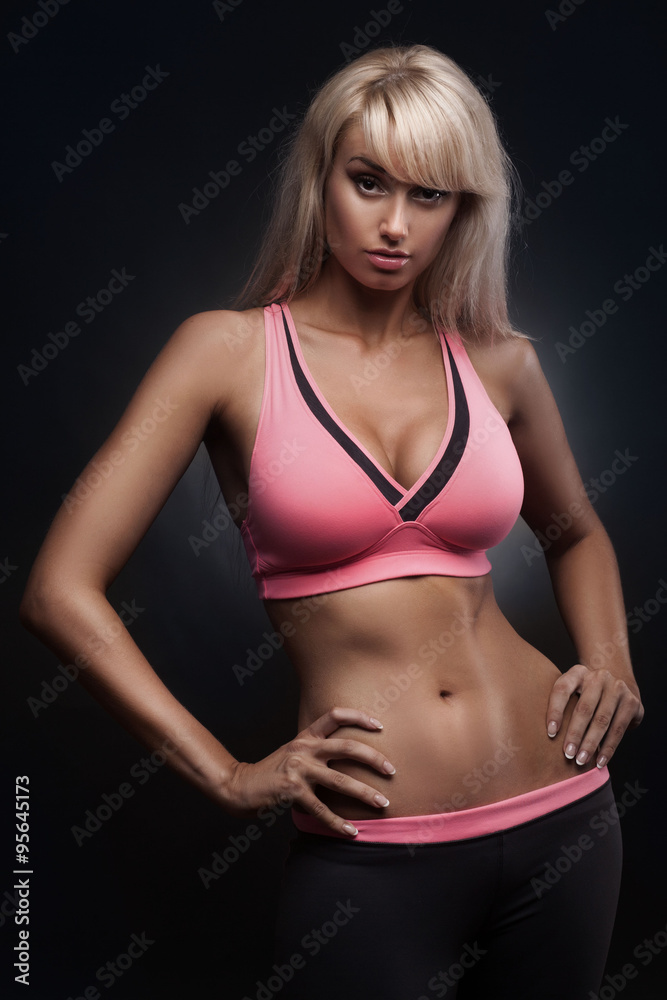 Fototapeta premium portrait of young fitness woman