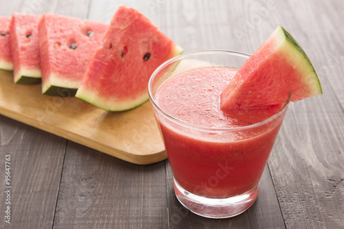 Healthy watermelon smoothie on a wood table