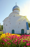 Decorative flowers on the background of orthodox church and sunl