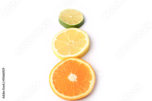 citrus orange lemon lime cut circles isolated on white background