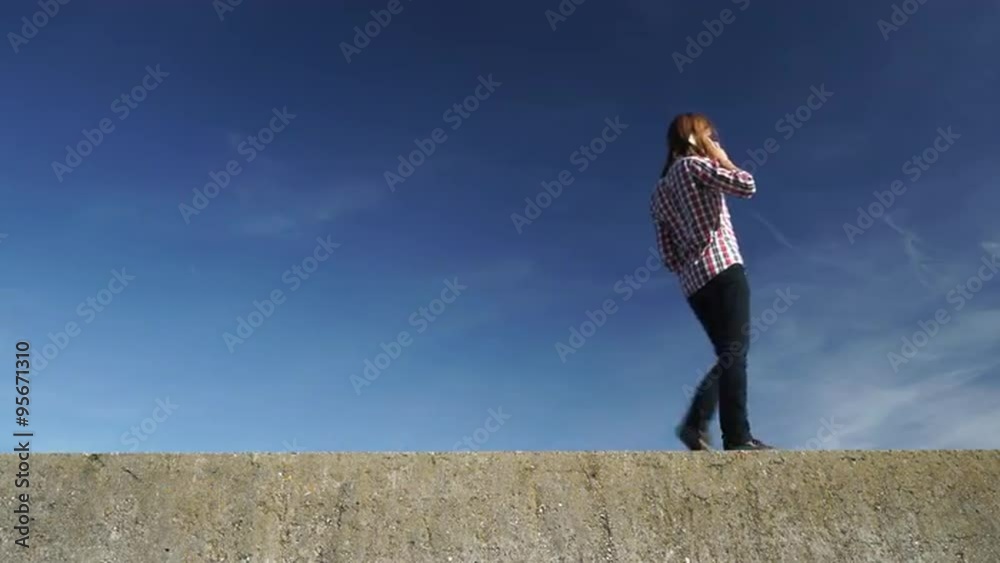 Man walking outdoor talking on cell phone 4K Man walking outdoor talking on cell phone 4K