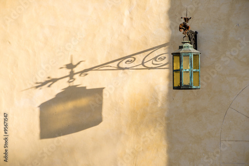 Street latern with artistic shadow. photo