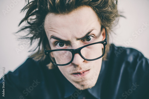 Young nerd with glasses portrait