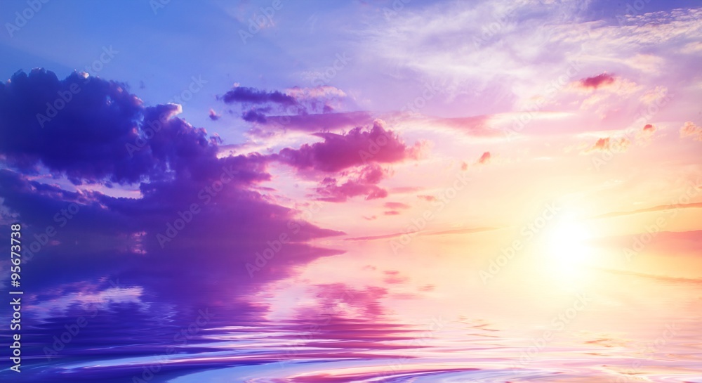 Fototapeta sky at sunset reflected in water
