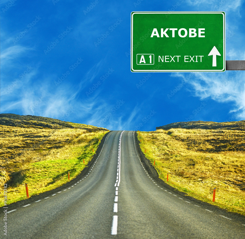 AKTOBE road sign against clear blue sky