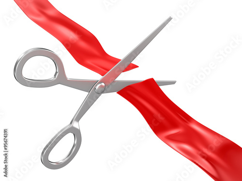 Scissors cutting red ribbon