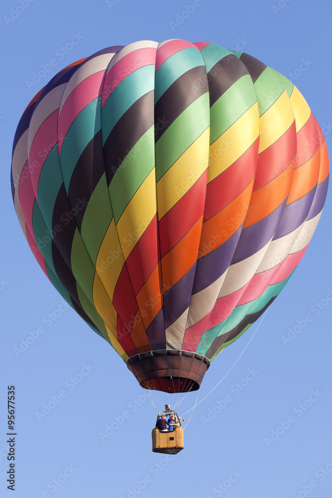 Obraz premium Colorful hot air balloons as part of the mass ascension launch of over 100 colorful balloons at the New Jersey Ballooning Festival