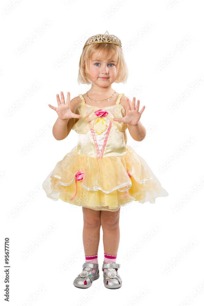 Little girl in a beautiful yellow dress and crown on white back Little girl in a beautiful yellow dress and crown on white back