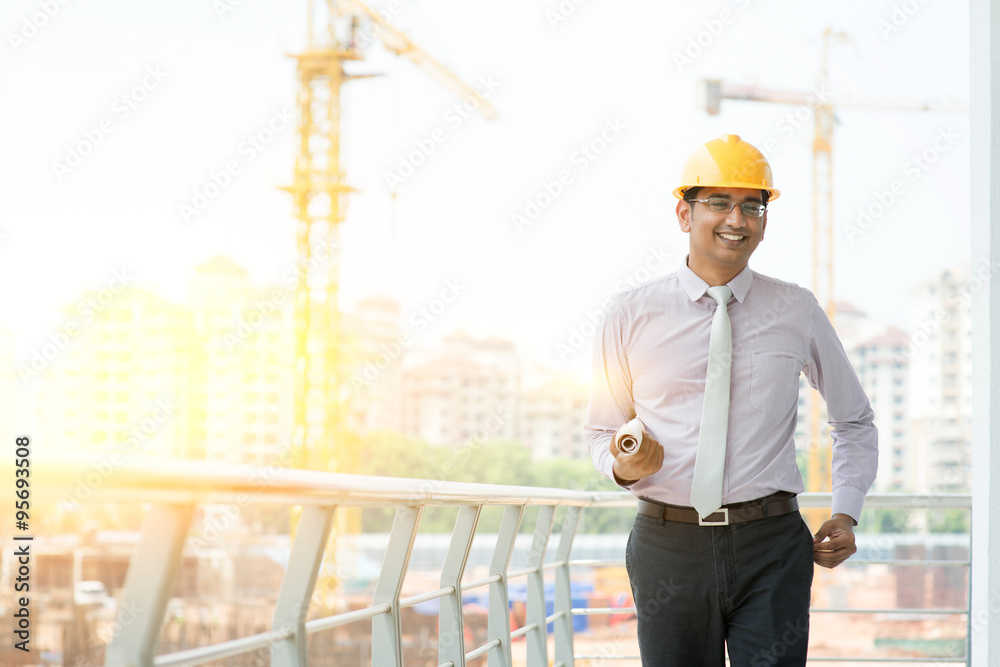 Asian Indian male site contractor engineer walking Asian Indian male site contractor engineer walking