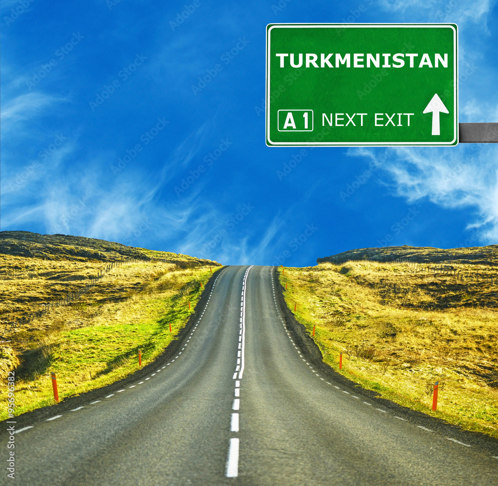 TURKMENISTAN road sign against clear blue sky