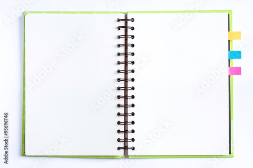 opened notebook with blank paper pages and color bookmarks