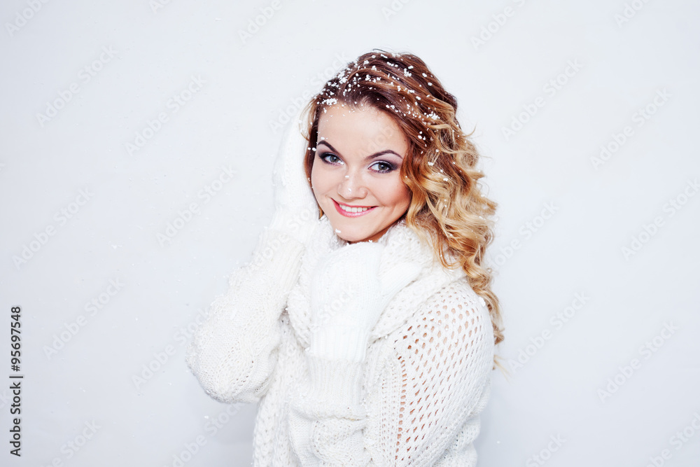 Woman in warm knitted scarf and gloves, portrait on white background, place for your text Woman in warm knitted scarf and gloves, portrait on white background, place for your text