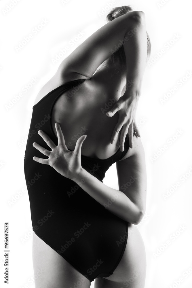 Naklejka premium Modern ballet dancer posing on white background