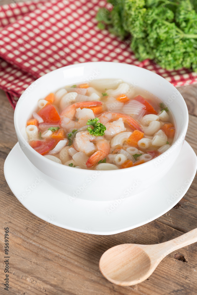 Macaroni with shrimp soup on white bowl. Macaroni with shrimp soup on white bowl.