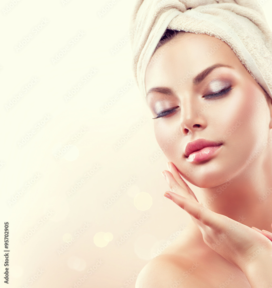 Spa woman. Beautiful girl after bath touching her face Stock-Foto ...