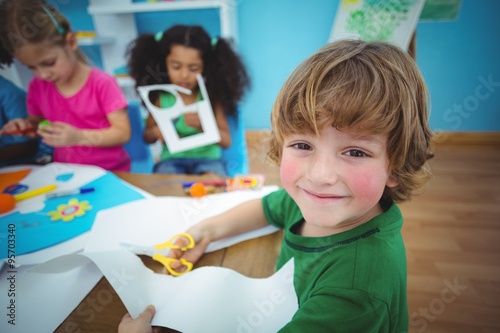 Happy kids doing arts and crafts together