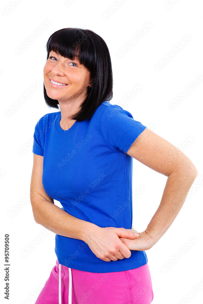 Portrait of smiling beautiful brunette women 40 years old, posing in blue T-shirt and sport pants. Ready for your design, isolated on white background Portrait of smiling beautiful brunette women 40 years old, posing in blue T-shirt and sport pants. Ready for your design, isolated on white background