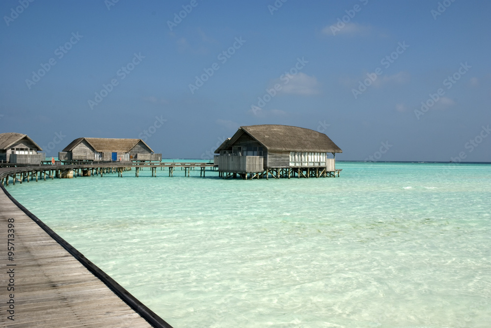 Maldivian lagoon with bungalow