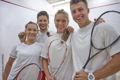 Fotografi Very successful team at a squash court.