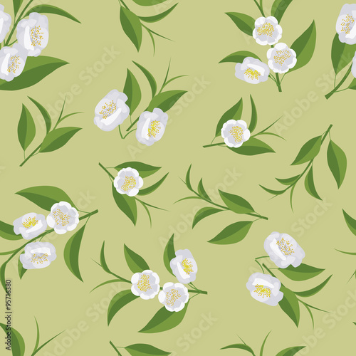 Seamless texture with leaves and flowers of tea. Camellia flowers.