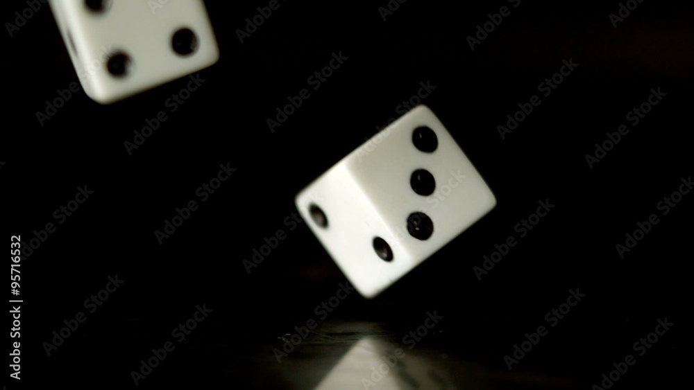 Dice falling on black background Dice falling on black background