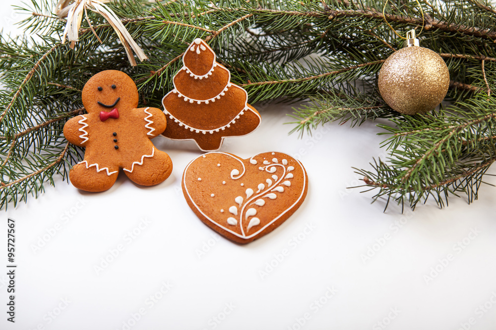 Christmas cookies with festive decoration on the white backgroun Christmas cookies with festive decoration on the white backgroun