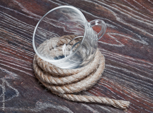 Glass Cup on a reel of rope