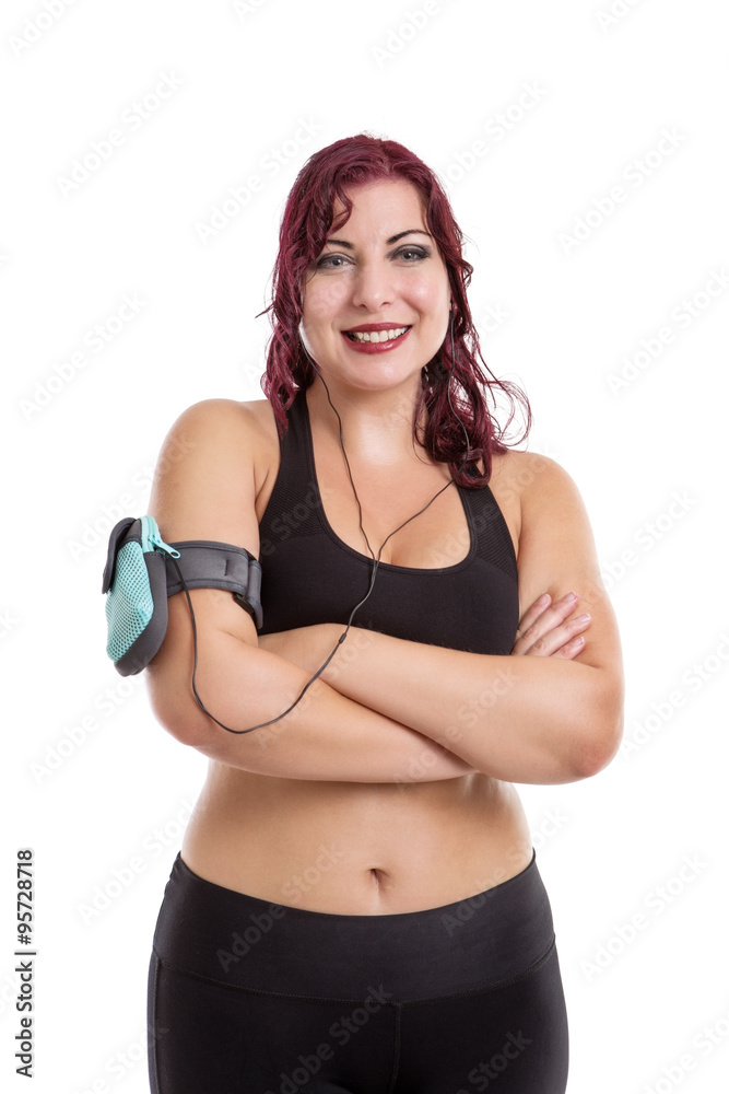 Fitness woman wearing earphones and mp3 player. Fitness woman wearing earphones and mp3 player.