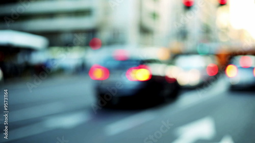 a representation of  traffic in urban context with blurred and out of focus background photo