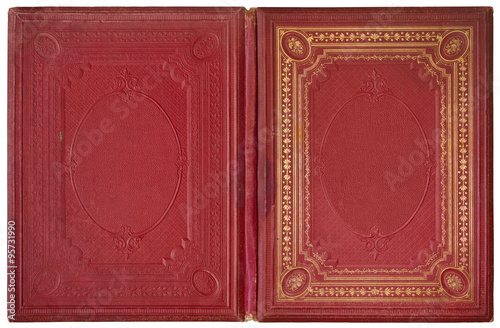 Old open book cover in red canvas with embossed golden abstract and floral ornaments - circa 1870 - isolated on white