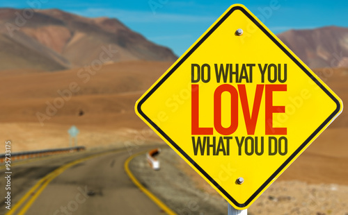 Do What You Love What You Do sign on desert road